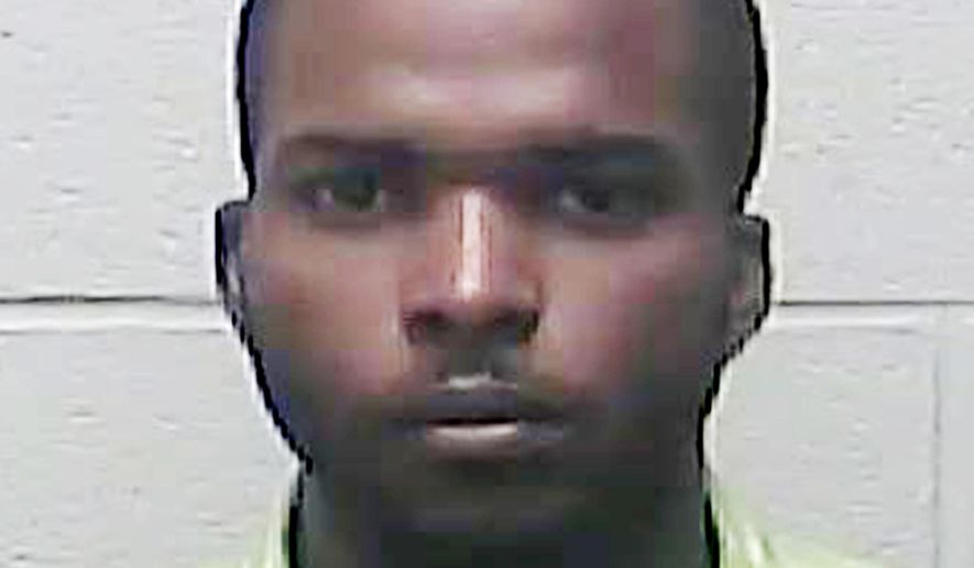 FILE - This undated file photo provided by Burleigh County Sheriff's Department in Bismarck, N.D. shows Lavrick Willocks, of Jamaica. Willocks, who is accused of masterminding a lottery scam that victimized dozens of Americans out of millions of dollars, on Friday, July 14, 2017, agreed to plead guilty to a conspiracy charge in federal court in North Dakota. Prosecutors will dismiss numerous other counts of fraud and money laundering against Willocks. (Burleigh County Sheriff's Department via AP, File)