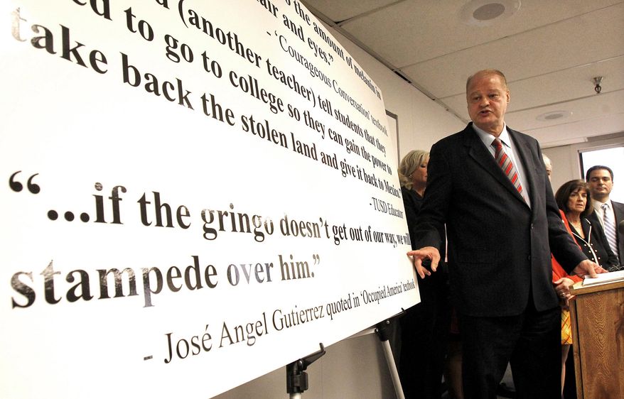 FILE - In this Jan 3, 2011, file photo, outgoing Arizona schools chief Tom Horne announces in Phoenix, Ariz., that a major school district in Tucson is violating a new state law by continuing an ethnic studies program designed primarily for Hispanics. Arizona authorities are back in federal court in Tucson this week over a years-long legal battle against a 2010 state law targeting ethnic studies in public schools that resulted in the shuttering of a popular Mexican-American Studies program, launching tense student protests. (AP Photo/Ross D. Franklin, file)