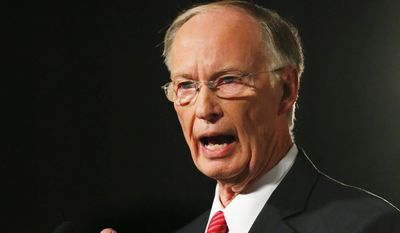 In this Feb. 7, 2017, file photo, Alabama Gov. Robert Bentley speaks during the annual State of the State address at the Capitol, in Montgomery, Ala.  Bentley is giving himself stellar marks three months after pleading guilty to criminal charges and resigning in disgrace. Bentley tells WVTM-TV in an interview in July 2017, that he was “by far” the best governor ever of Alabama. (AP Photo/Brynn Anderson, File)
