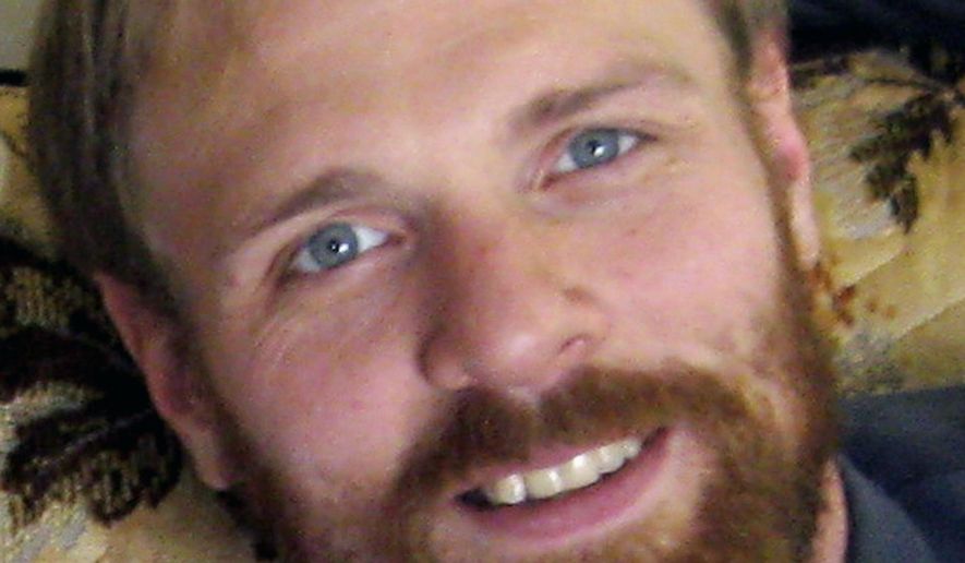 FILE - This 2014 file photo provided by Gary Lentzkow, shows his son Matthew Lentzkow in La Porte City, Iowa. The parents of Matthew, a handcuffed detainee killed in a 2014 highway accident after escaping from an Iowa State Patrol car, have dropped their lawsuit against the state. Attorney Joe Cacciatore said Tuesday, July 18, 2017, that Lentzkow's parents believe they achieved the goal of learning about the incident and want to move on. (AP Photo/Gary Lentzkow, File)