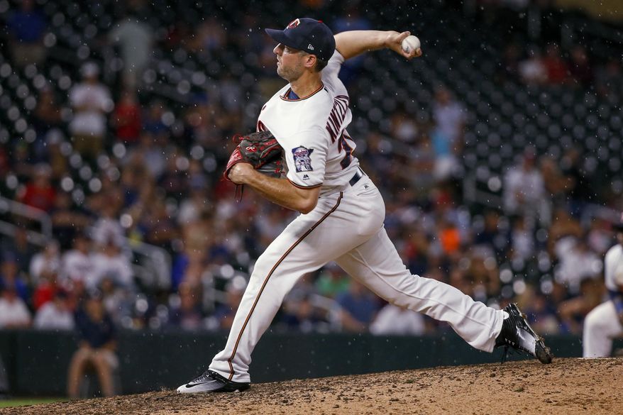 Minnesota Twins relief pitcher Brandon Kintzler throws to the New York Yankees during the ninth inning of a baseball game Monday, July 17, 2017, in Minneapolis. The Twins won 4-2. (AP Photo/Bruce Kluckhohn)