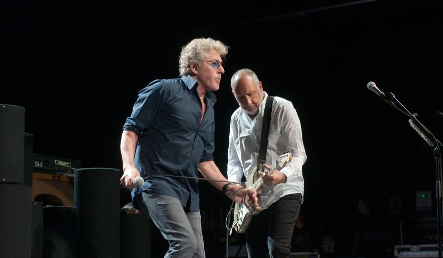 Roger Daltrey (left) and Pete Townshend, the two surviving original members of The Who, perform at The Theater at MGM National Harbor in Oxon Hill, Maryland, July 18, 2017.  (Erica Bruce/Special to The Washington Times)