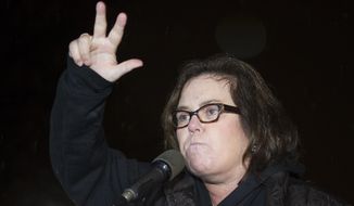 Rosie O&#39;Donnell speaks at a rally calling for resistance to President Donald Trump in Lafayette Park in front of the White House in Washington, prior the president&#39;s address to a joint session of Congress, Feb. 28, 2017. (AP Photo/Cliff Owen) ** FILE **