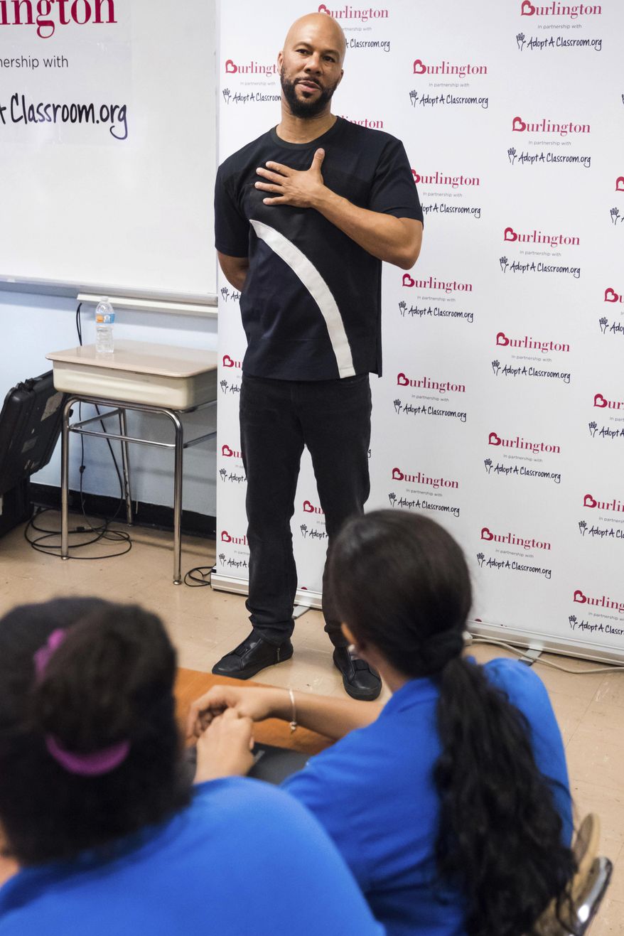 Musician and actor Common visits the Renaissance School of the Arts as an ambassador for AdoptAClassroom.org and Burlington Stores on Thursday, July 20, 2017, in New York. Common will be fulfilling all the wish lists that teachers and faculty put together for the school's needs for the upcoming year. (Photo by Charles Sykes/Invision/AP)