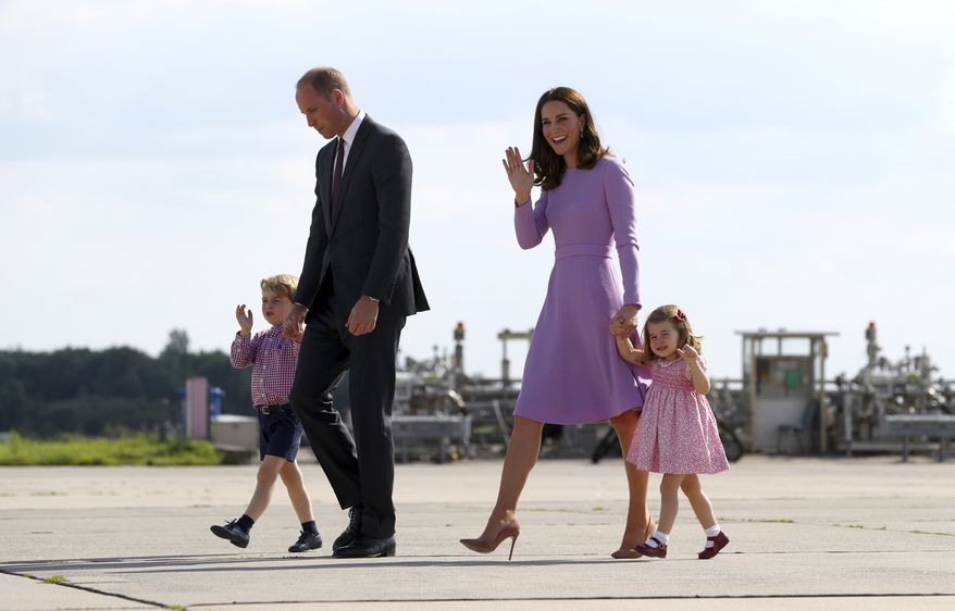Britain's Prince William, second left, and his wife Kate, the Duchess of Cambridge, second right, and their children, Prince George, left, and Princess Charlotte, right, board a plane in Hamburg, Germany, Friday, July 21, 2017. Britain's Prince William and his wife Kate, and their children Prince George and Princess Charlotte stayed for thee days in Germany and visited Berlin, Heidelberg and Hamburg. ( Christian Charisius/Pool Photo via AP)