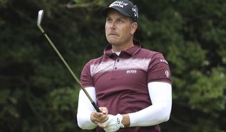 Sweden&#39;s Henrik Stenson watches his shot off the 5th tee during the second round of the British Open Golf Championship, at Royal Birkdale, Southport, England, Friday July 21, 2017. (AP Photo/Peter Morrison)