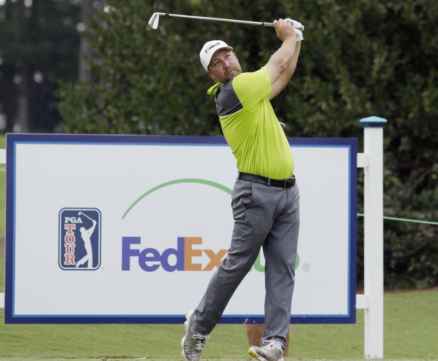 Chad Collins hits from the 17th tee during the second round of the Barbasol Championship golf tournament at Grand National Golf Course in Opelika, Ala., Friday, July 21, 2017. Collins missed a chance for the 10th sub-60 round in PGA Tour history and third of the season, parring the final two holes for an 11-under 60. (Todd J. Van Emst/Opelika-Auburn News via AP)