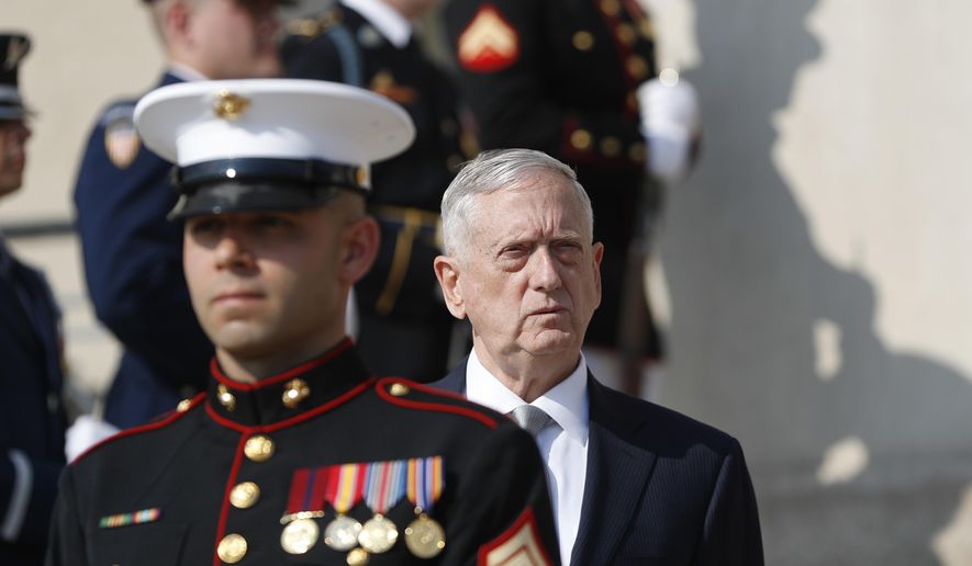 In this July 10, 2017, file photo, Defense Secretary Jim Mattis waits before an honor cordon at the Pentagon. The Trump administration is still sorting out “the big ideas” for a new Afghanistan strategy, beyond troop levels and other military details, Defense Secretary Jim Mattis said Friday, July 21, 2017.  (AP Photo/Pablo Martinez Monsivais, File)