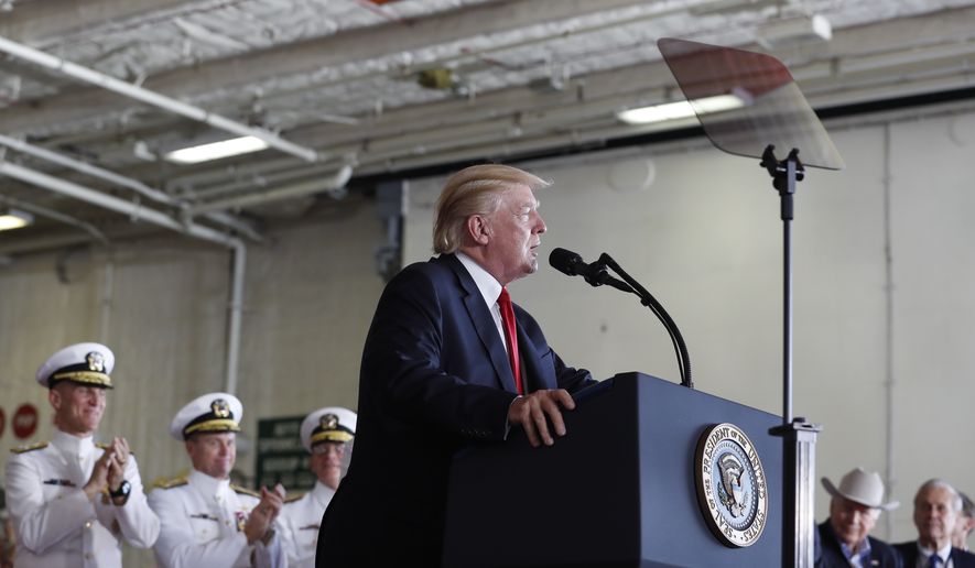 President Donald Trump speaks during the commissioning ceremony of the aircraft carrier USS Gerald R. Ford (CVN 78) at Naval Station Norfolk, Va., Saturday, July, 22, 2017. Seated behind the president are Former Vice President Dick Cheney, second from right, and former Secretary of Defense, Donald Rumsfeld, right. (AP Photo/Carolyn Kaster)