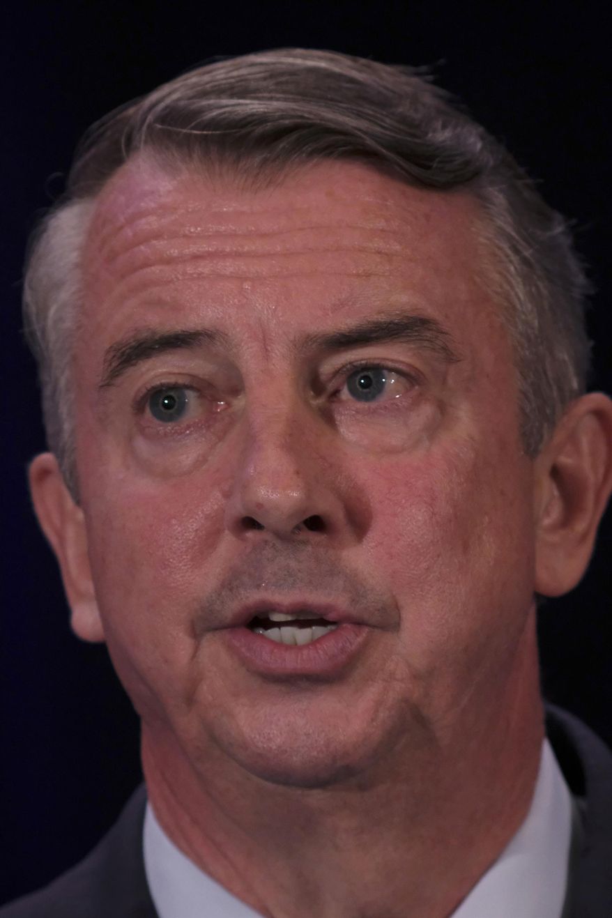 GOP gubernatorial candidate Ed Gillespie, speaks on stage at the Omni Homestead Resort in Hot Springs, Va., Saturday, July 22, 2017. The two major party candidates in Virginia's closely watched race for governor clashed at their first debate over President Donald Trump, health care, immigration, and social issues. ( Bob Brown/Richmond Times-Dispatch via AP)