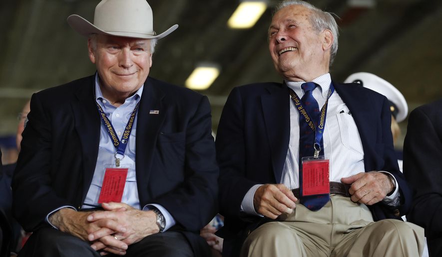 Former Vice President Dick Cheney, left, and former Secretary of Defense, Donald Rumsfeld, sit together on stage during the commissioning ceremony of the aircraft carrier USS Gerald R. Ford (CVN 78) at Naval Station Norfolk, Va., Saturday, July, 22, 2017. (AP Photo/Carolyn Kaster)