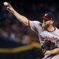 Washington Nationals&#39; Stephen Strasburg throws a pitch against the Arizona Diamondbacks during the first inning of a baseball game Sunday, July 23, 2017, in Phoenix. (AP Photo/Ross D. Franklin)
