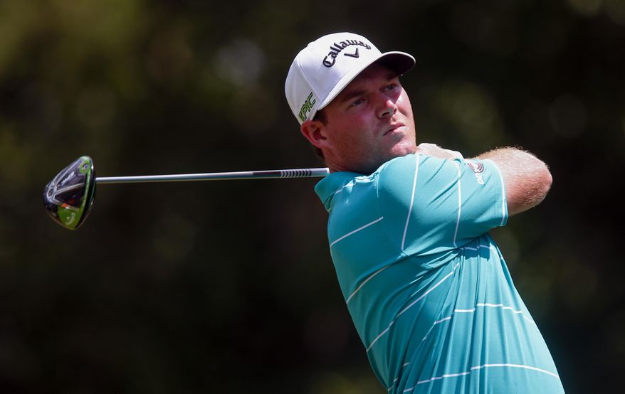 Grayson Murray tees off on the fourth hole in the final round of the Barbasol Championship golf tournament, Sunday, July 23, 2017, in Opelika, Ala. (AP Photo/Butch Dill)