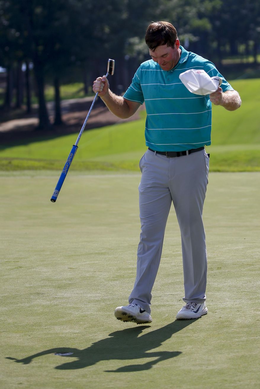 Grayson Murray reacts after winning the Barbasol Championship golf tournament, Sunday, July 23, 2017, in Opelika, Ala. (AP Photo/Butch Dill)