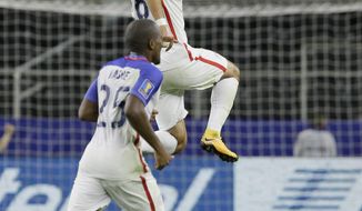 United States&#x27; Clint Dempsey, top, celebrates after scoring a goal against Costa Rica during a CONCACAF Gold Cup semifinal soccer match in Arlington, Texas, Saturday, July 22, 2017. (AP Photo/LM Otero)