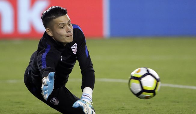 U.S. goalie Jesse Gonzalez warms up for a CONCACAF Gold Cup quarterfinal soccer match against El Salvador, in Philadelphia, Wednesday, July 19, 2017. After starting at the 2015 Under-20 World Cup for Mexico, the land of his parents, 22-year-old FC Dallas goalkeeper Jesse Gonzalez switched his affiliation this summer to the United States, where he grew up. Gonzalez wanted to play for the nation where he felt most comfortable. (AP Photo/Matt Rourke)