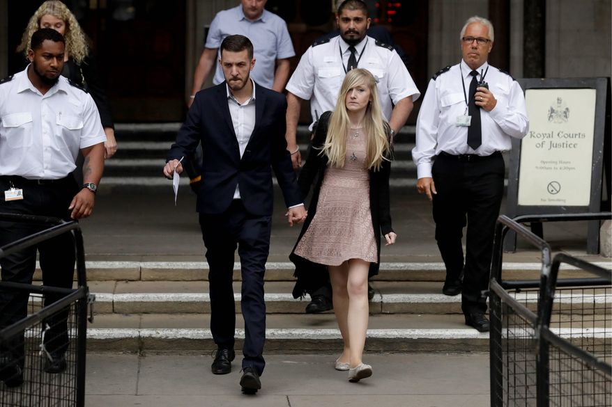 Connie Yates and Chris Gard, the parents of critically ill baby Charlie Gard, dropped their legal bid Monday after medical tests showed that the window of opportunity to help him had closed. (Associated Press)