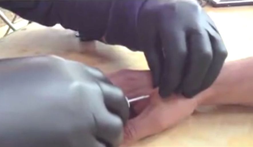 Wisconsin-based Three Square Market will soon offer its employees the option of having microchips implanted under their skin. The technology will work in tandem with computers, allow employees to pay for food, and open doors. (KSTP-TV ABC-5 Wisconsin screenshot)