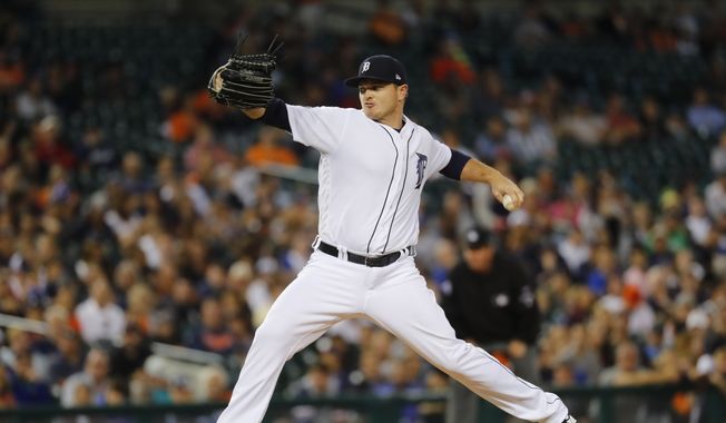 Detroit Tigers relief pitcher Justin Wilson (38) throws against the Kansas City Royals in the ninth inning of a baseball game in Detroit, Monday, July 24, 2017. (AP Photo/Paul Sancya)