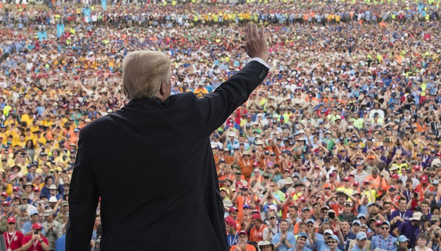 President Donald Trump waves to the crowd after speaking at the 2017 National Scout Jamboree in Glen Jean, W.Va., Monday, July 24, 2017. (AP Photo/Carolyn Kaster)