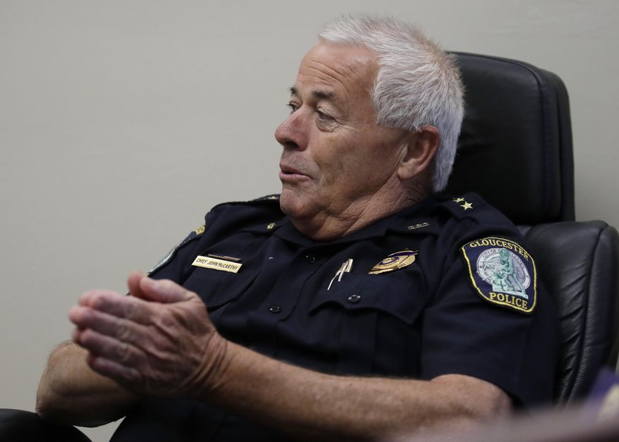 In this July 13, 2017 photo, Gloucester Police Chief John McCarthy discusses a new Angel Program outreach plan that will be instituted with community advocates at the Police Assisted Addiction and Recovery Initiative, at the police station in Gloucester, Mass. Gloucester, like many other communities, is seeing more addicts overdosing on more potent varieties of the drug than it did when its amnesty program rocketed to national notoriety. The rising toll is prompting city officials to try new approaches. (AP Photo/Charles Krupa)