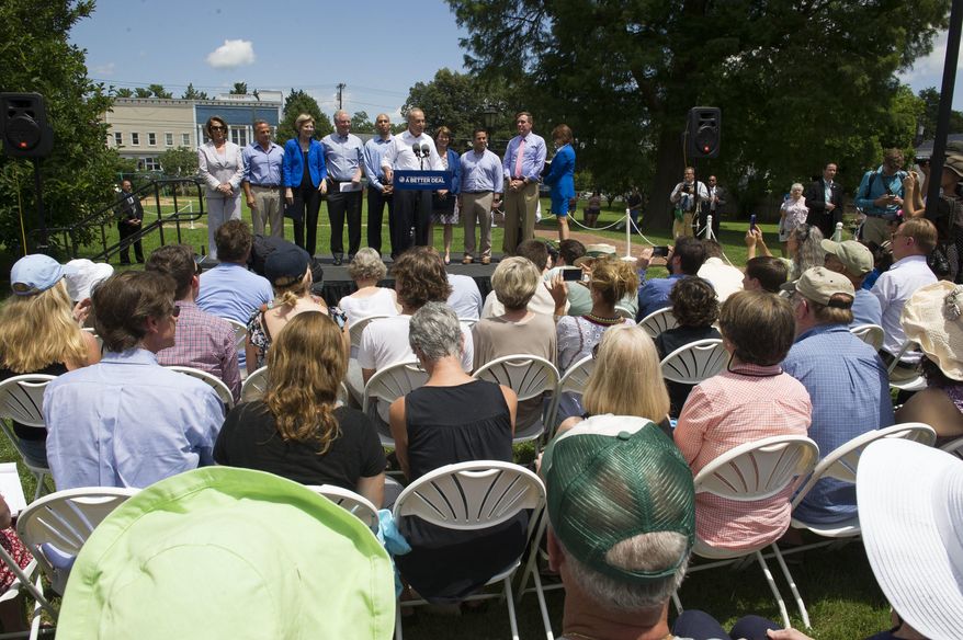 Senate Minority Leader Chuck Schumer of N.Y., joined by Congressional Democrats speaks in Berryville, Va., Monday, July 24, 2017, to unveil the Democrats new agenda. (AP Photo/Cliff Owen)