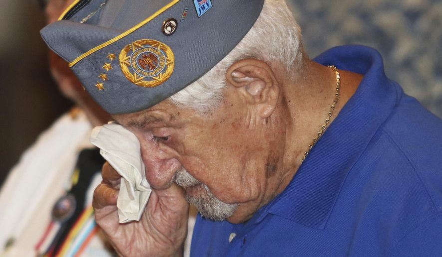 World War II veteran Sam Greenberg dabs his eyes during an emotional moment at the Korea War program at the Luzerne County Courthouse.on Saturday, July 22, 2017, in Wilkes Barre Pa. Greenberg&#39;s brother Martin, who was a decorated medic during the Korean War, passed away this past February. Greenberg attended in his place. (Dave Scherbenco/The Citizens&#39; Voice via AP)