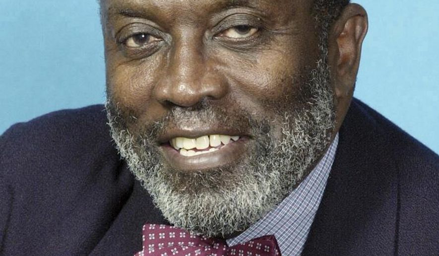 FILE - This Jan. 17, 2002 file photo shows former Associated Press staff photographer James A. Finley. Finley, an acclaimed photojournalist who served as a mentor to countless others during his 22-year career as an AP photographer, died Sunday, July 23, 2017 at his home in St. Louis. He was 76. (AP Photo, File)