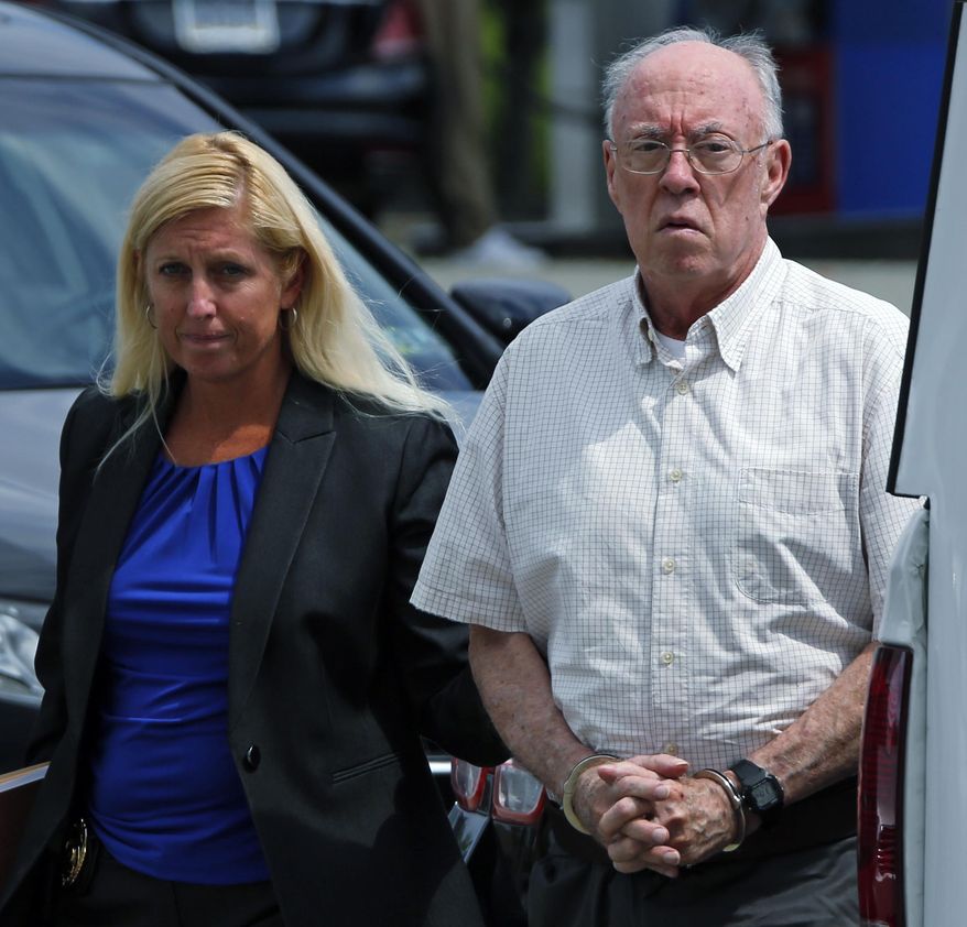 Rev. John T. Sweeney, of Greensburg, Pa., right, arrives for an appearance before District Judge Cheryl J. Peck-Yakopec, in Leechburg, Pa., Monday, July 24, 2017. Pennsylvania Attorney General Josh Shapiro announced that Sweeney was arrested today and charged with involuntary sexual intercourse, a first-degree felony, for a sexual assault committed against a 10-year-old boy. (AP Photo/Gene J. Puskar)