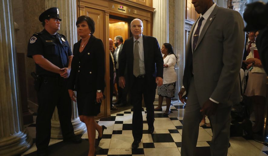 Sen. John McCain, R-Ariz. arrive on Capitol Hill in Washington, Tuesday, July 25, 2017, as the Senate was to vote on moving head on health care with the goal of erasing much of Barack Obama&#x27;s law.  (AP Photo/Andrew Harnik)