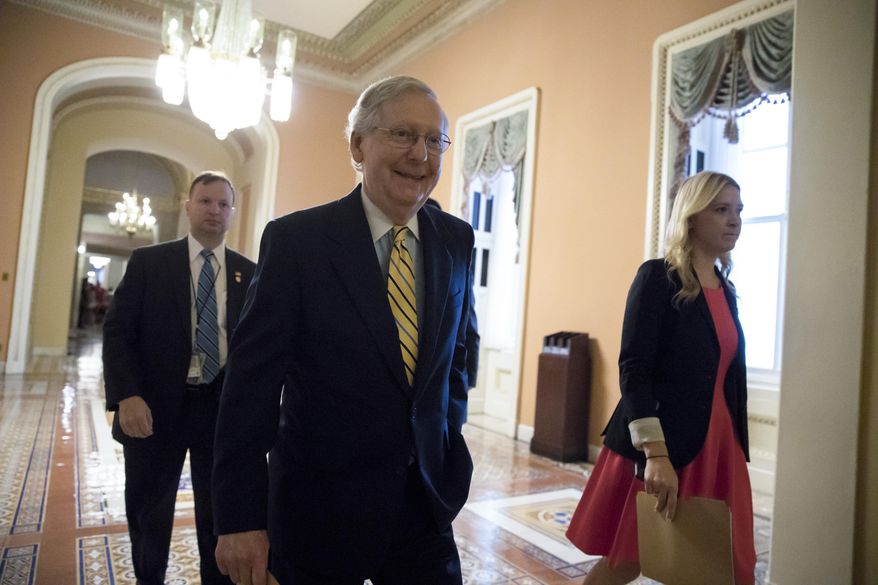 Senate Majority Leader Mitch McConnell of Ky. walks from his office on Capitol Hill in Washington, Tuesday, July 25, 2017, as he steers the Senate toward a crucial vote on the Republican health care bill. (AP Photo/J. Scott Applewhite)