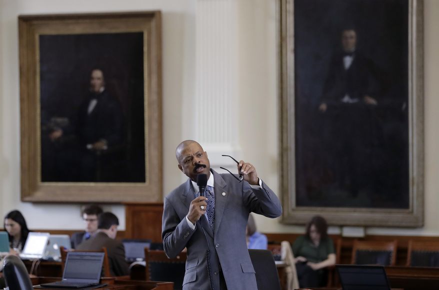 State Sen. Borris Miles, D-Houston, speaks during debate over a "bathroom bill" in the Senate Chamber, Tuesday, July 25, 2017, in Austin, Texas. The Texas Senate has revived a bill mandating transgender Texans use public restrooms corresponding to their birth-certificate genders. (AP Photo/Eric Gay)