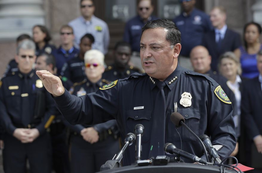 Houston Police Chief Art Acevedo and other law enforcement take part in public safety event where they spoke against a proposed "bathroom bill," Tuesday, July 25, 2017, in Austin, Texas. The Texas Senate has revived a bill mandating transgender Texans use public restrooms corresponding to their birth-certificate genders. (AP Photo/Eric Gay)