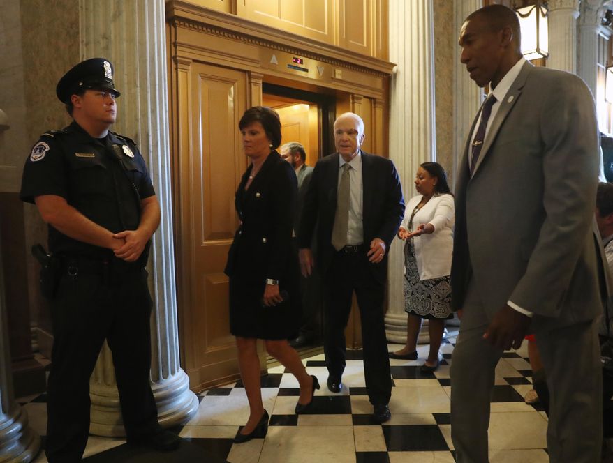 Sen. John McCain, R-Ariz. arrives on Capitol Hill in Washington, Tuesday, July 25, 2017, as the Senate was to vote on moving head on health care with the goal of erasing much of Barack Obama's law. (AP Photo/Andrew Harnik)