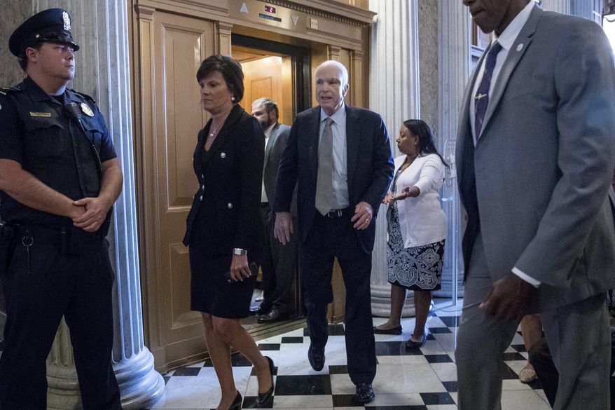 Sen. John McCain, R-Ariz. arrives on Capitol Hill in Washington, Tuesday, July 25, 2017, as the Senate was to vote on moving head on health care with the goal of erasing much of Barack Obama's law. (AP Photo/Andrew Harnik)