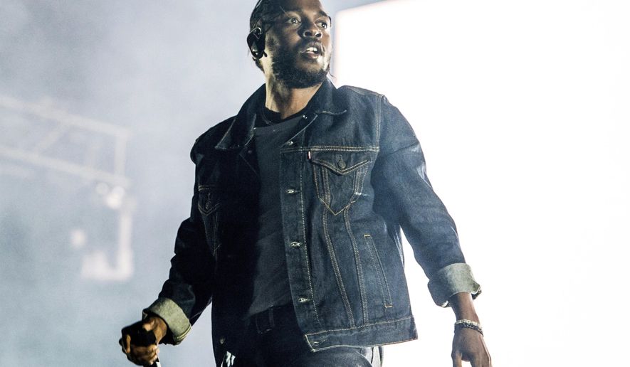 FILE - In this July 7, 2017 file photo, Kendrick Lamar performs during the Festival d'ete de Quebec in Quebec City, Canada. Lamar is the leader of the MTV Video Music Awards with eight nominations. The 2017 VMAs will air live Aug. 27 from the Forum in Inglewood, Calif. (Photo by Amy Harris/Invision/AP, File)