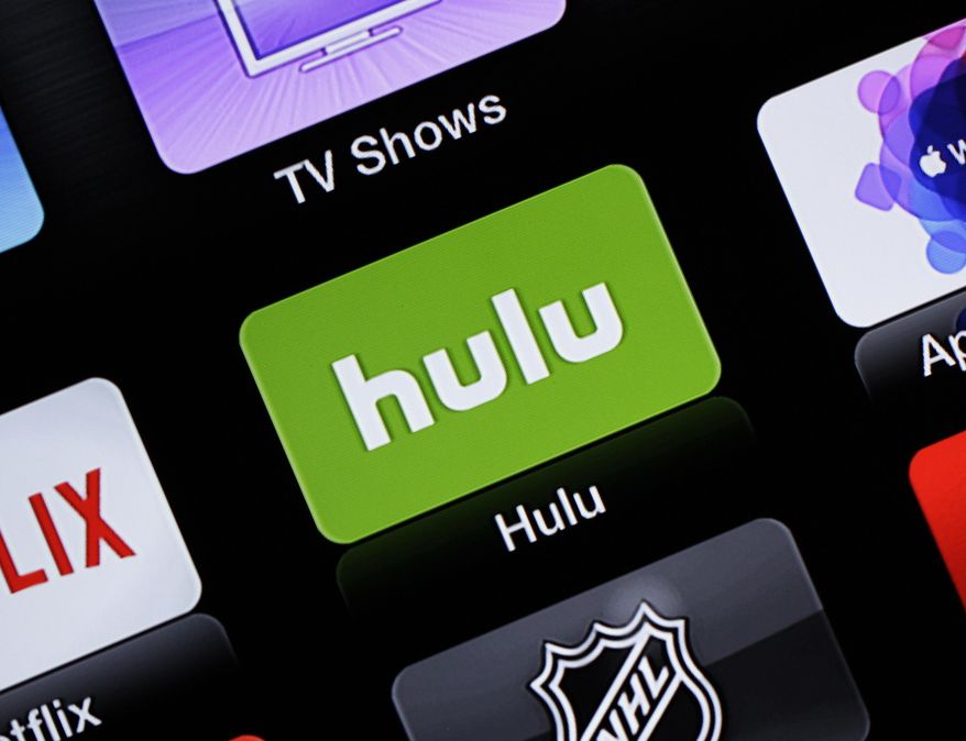 FILE - This June 24, 2015, file photo shows the Hulu Apple TV app icon. Nielsen says it will start counting how many people are watching live TV services from online streaming companies Hulu and YouTube, giving media companies and advertisers more insight on how many folks are watching network shows beyond the traditional TV screen. (AP Photo/Dan Goodman, File)