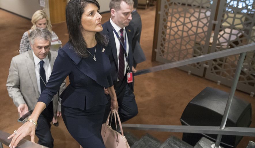 American Ambassador to the United Nations Nikki Haley, center, leaves after attending a Security Council meeting on the situation in the Middle East, including the Palestinian question, Tuesday, July 25, 2017 at United Nations headquarters. (AP Photo/Mary Altaffer)
