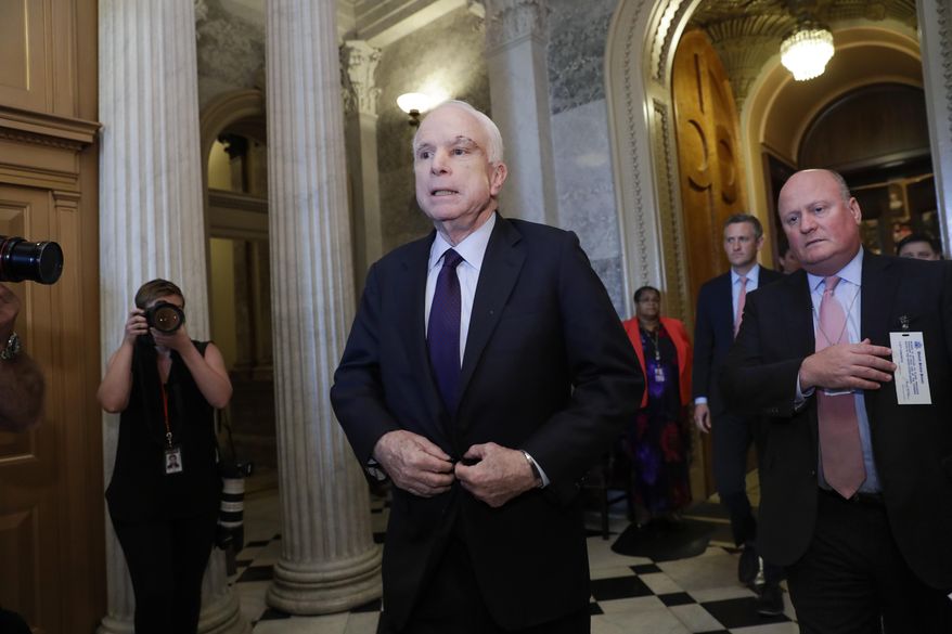 Sen. John McCain, R-Ariz., who returned to Capitol Hill after being diagnosed with an aggressive type of brain cancer, leaves the chamber after vote the Republican-run Senate rejected a GOP proposal to scuttle President Barack Obama's health care law, Wednesday, July 26, 2017, in Washington. President Donald Trump and Senate Majority Leader Mitch McConnell, R-Ky., have been stymied by opposition from within the Republican ranks. (AP Photo/J. Scott Applewhite)