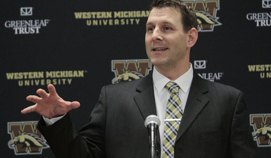 In this Jan. 14, 2017, photo, Tim Lester speaks as he made his first public appearance as the new NCAA college football head coach at Western Michigan University, in Kalamazoo, Mich. The planets aligned for long-suffering Western Michigan last season, earning the Broncos their first Mid-American Conference Championship since 1988 and a major bowl bid. (Jake Green/Kalamazoo Gazette-MLive Media Group via AP)