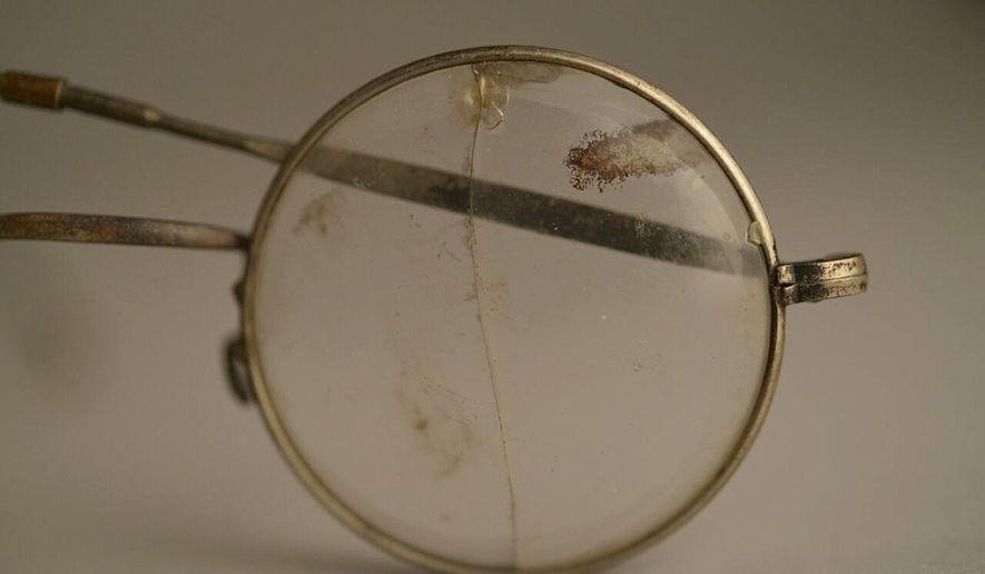 This photo made available by the Aushwitz Museum on Wednesday, July 26, 2017 shows a pair of glasses that once belonged to a person who perished at the Nazi German death camp. Officials at the museum of the Nazi German death camp of Auschwitz say some exhibits are going on a tour of Europe and North America to bring its tragic truth about the Holocaust to a wider audience. The museum said Wednesday this will be its first-ever traveling exhibition and will include some 600 items. The "Not long ago: Not far away" exhibit will include personal items of the victims and a German freight wagon the Nazis used to bring inmates in. (Pawel Sawicki/Aushwitz Museum via AP)