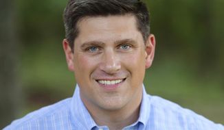 This undated photo provided by Kevin Nicholson, shows Nicholson, a former Marine and past president of a national college Democratic group, who posted online Wednesday, July 26, 2017, that he has launched a Republican bid for the U.S. Senate in Wisconsin, becoming the first GOP challenger to Democratic Sen. Tammy Baldwin. (Kevin Nicholson via AP)
