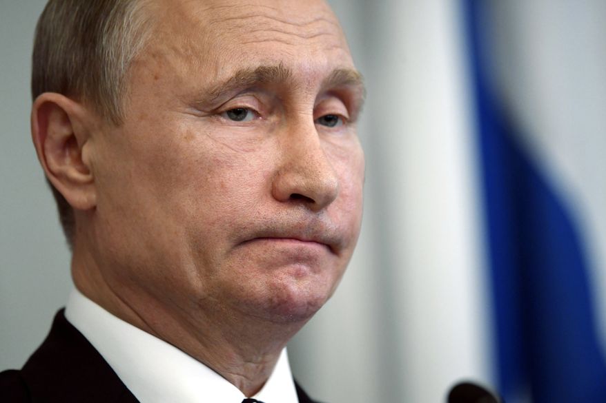 Responding to new sanctions approved by Congress, Russian President Vladimir Putin said he was growing tired of &quot;loutish behavior toward our country.&quot; (Associated Press)