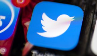 This Wednesday, April 26, 2017, photo shows the Twitter app on a smartphone in Philadelphia. Twitter Inc. reports earnings, Thursday, July 27, 2017. (AP Photo/Matt Rourke)