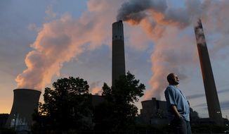 Herman Marshman stands outside the First Energy Bruce Mansfield coal fired power plant Friday, July 7, 2017, in Shippingport, Pa.   Marshman ran for president of the International Brothers of Electrical Workers Local 272, with no union leadership experience.  (Rebecca Droke/Pittsburgh Post-Gazette via AP)