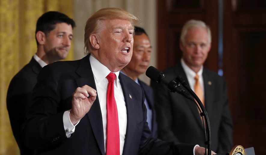 President Donald Trump speaks in the East Room accompanied by House Speaker Paul Ryan of Wis., Foxconn CEO and founder Terry Gou, and Sen. Ron Johnson, R-Wis., at the White House in Washington, Wednesday, July 26, 2017. Trump said that electronics giant Foxconn will build a $10 billion factory in Wisconsin that's expected to create 3,000 jobs.(AP Photo/Carolyn Kaster)