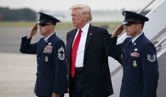 President Donald Trump steps off Air Force One after arriving at Long Island MacArthur Airport in Ronkonkoma, N.Y., Friday, July 28, 2017, to speak on the street gang MS-13. (AP Photo/Evan Vucci) ** FILE **
