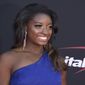 FILE - In this July 12, 2017, file photo, gymnast Simone Biles arrives at the ESPYS at the Microsoft Theater in Los Angeles. Biles shared a video of herself on July 27, 2017, taken after she had surgery to have her wisdom teeth removed. The Olympic champion appears on a recovery room bed with gauze in her mouth yelling something incomprehensible and pretending to drive a car. She wrote that she hopes the 27-second clip makes people laugh. (Photo by Jordan Strauss/Invision/AP, File)