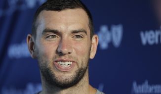 Indianapolis Colts&#x27; Andrew Luck talks with media after arriving for NFL football training camp, Saturday, July 29, 2017, in Indianapolis. (AP Photo/Darron Cummings)