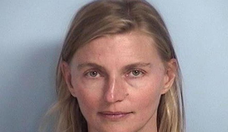 This photo provided by Walton County Sheriff's Office shows Terri White, the commissioner for the Oklahoma Department of Mental Health and Substance Abuse Services, who was jailed July 21, 2017, on a misdemeanor battery complaint after calling police in attempts to deescalate a family dispute. White was arrested in Florida after throwing a cup of water on a family member during a confrontation, but her case was dismissed because prosecutors said the family member decided not to pursue charges, the official said Saturday, July 29, 2017. (Walton County Sheriff's Office via AP)